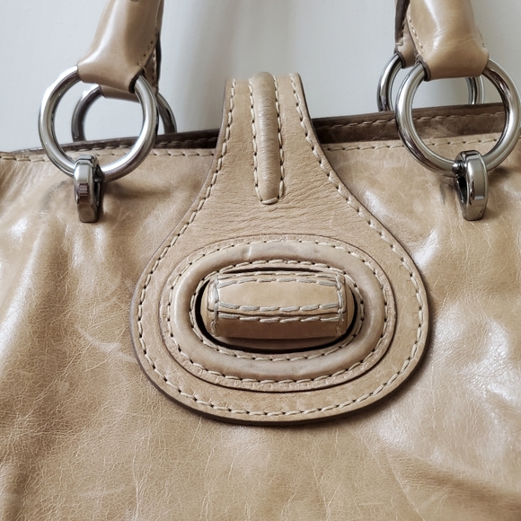 Beige leather rare Prada bag in great condition and lots of room.